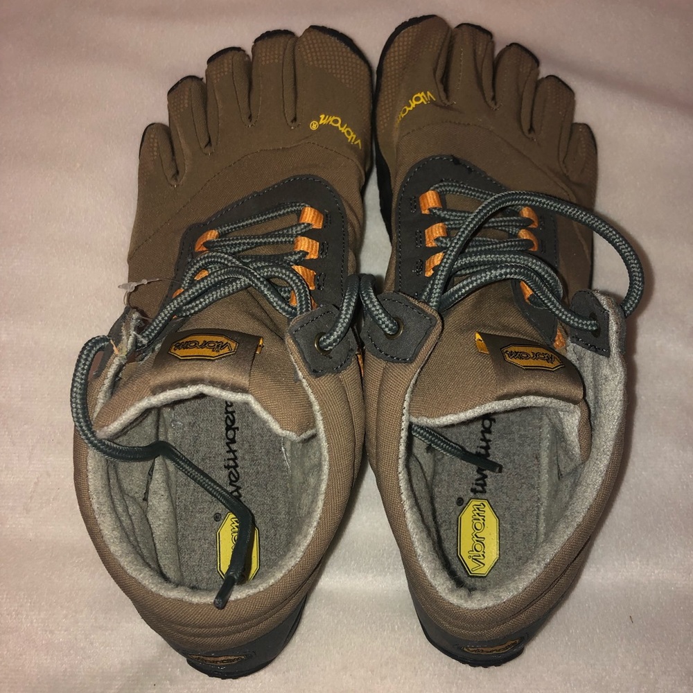 Never worn Vibram five toe shoes/hiking boot